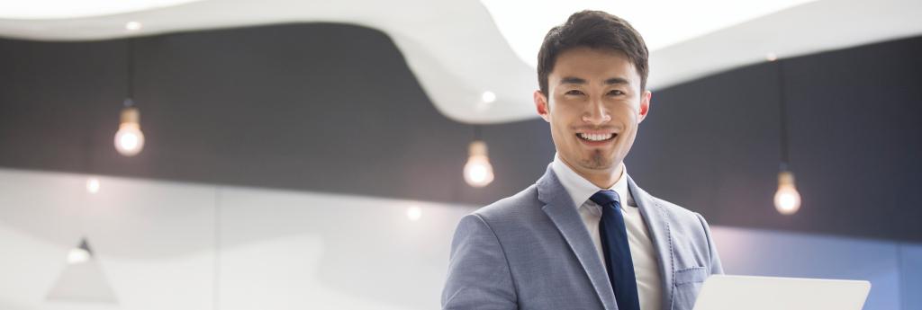 Man Standing in an Office