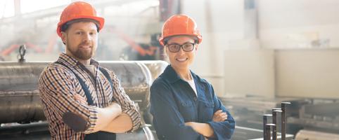 Two engineers working at a factory